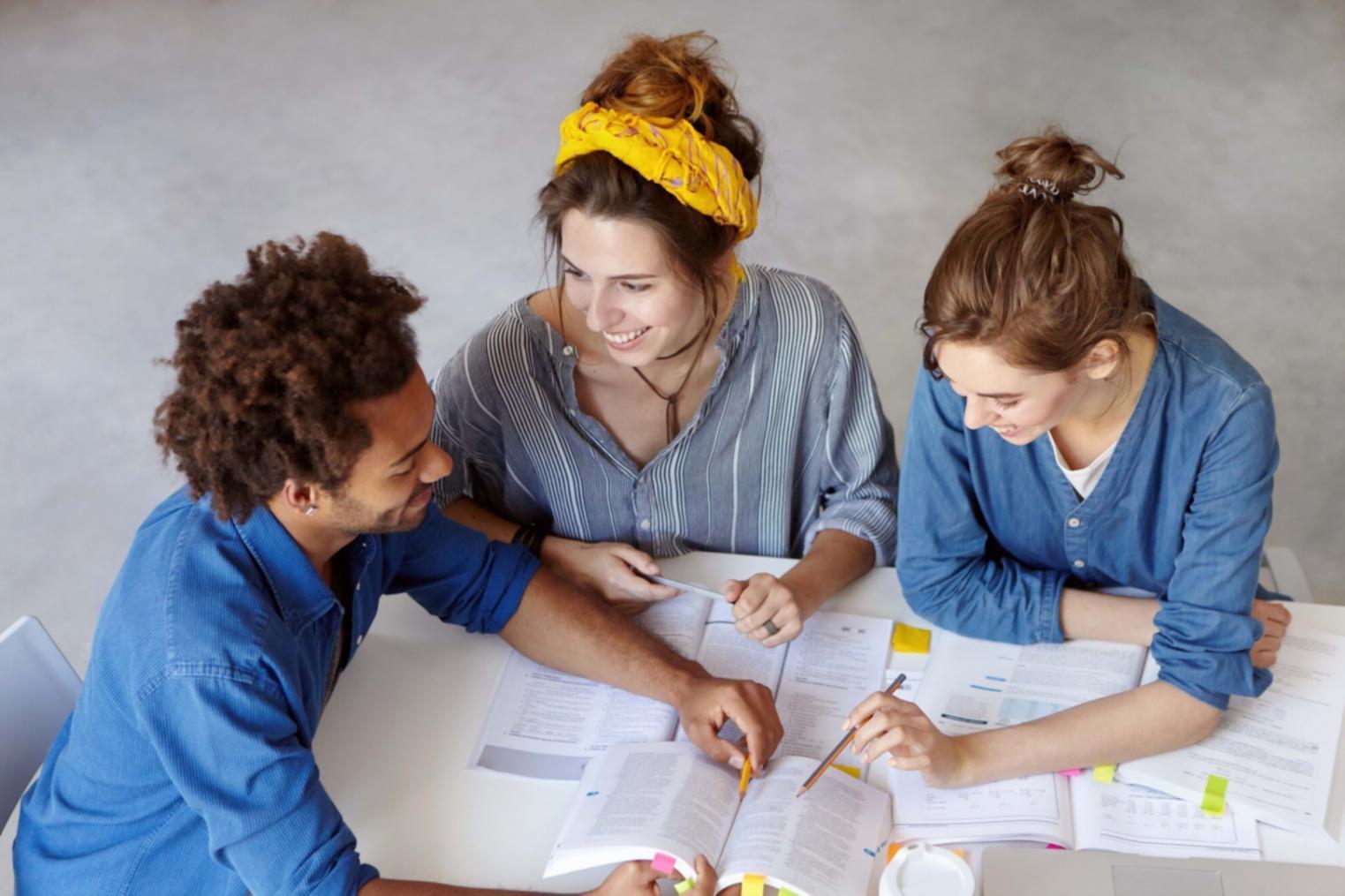Collaborative learning environment with participants engaged in group discussion