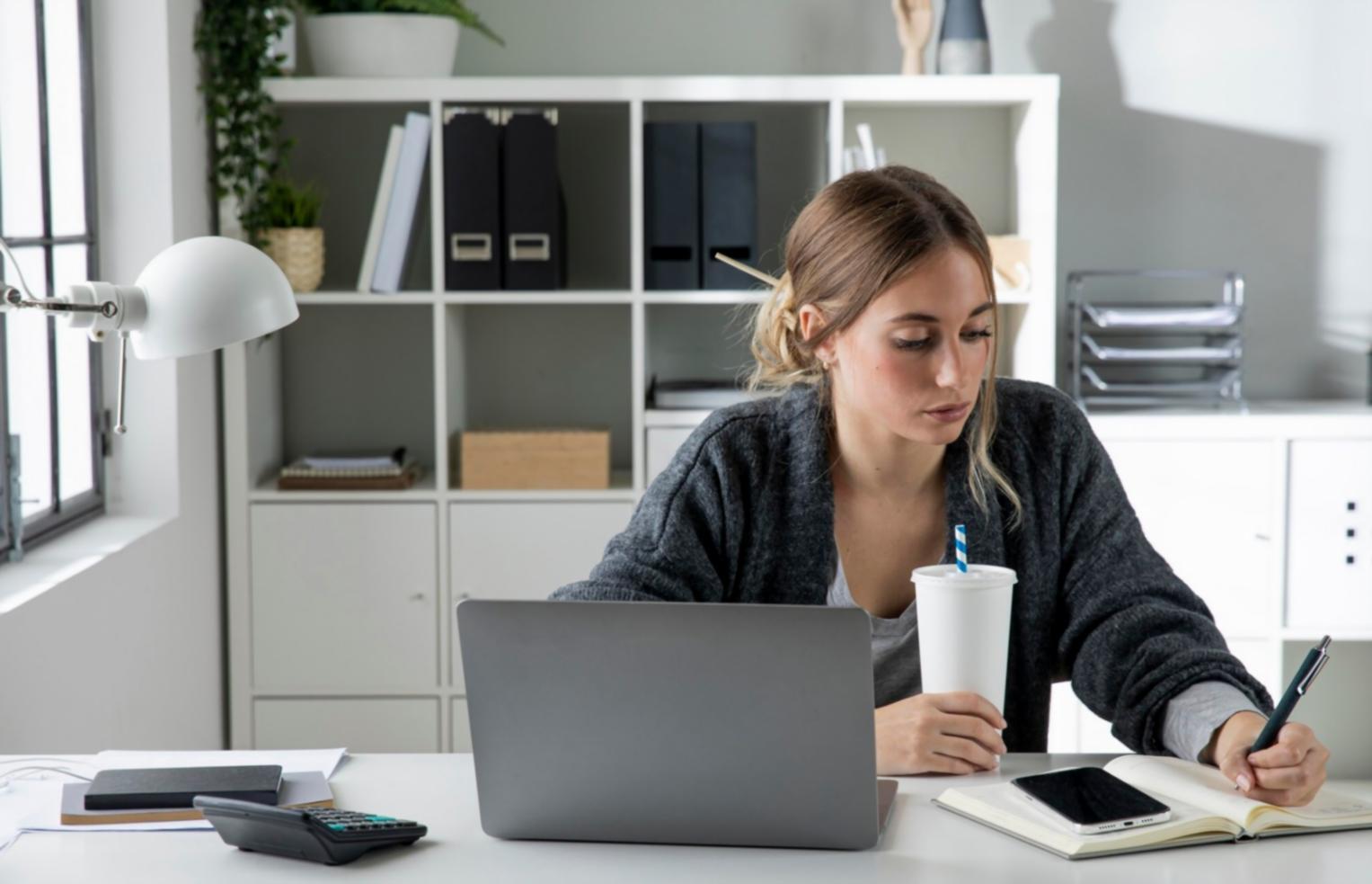 Hands sketching business concept in notebook