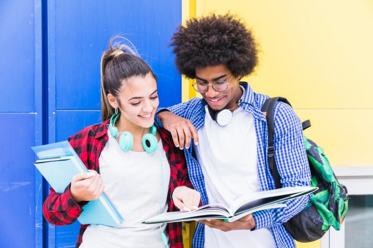 Small business owner reviewing business model on whiteboard